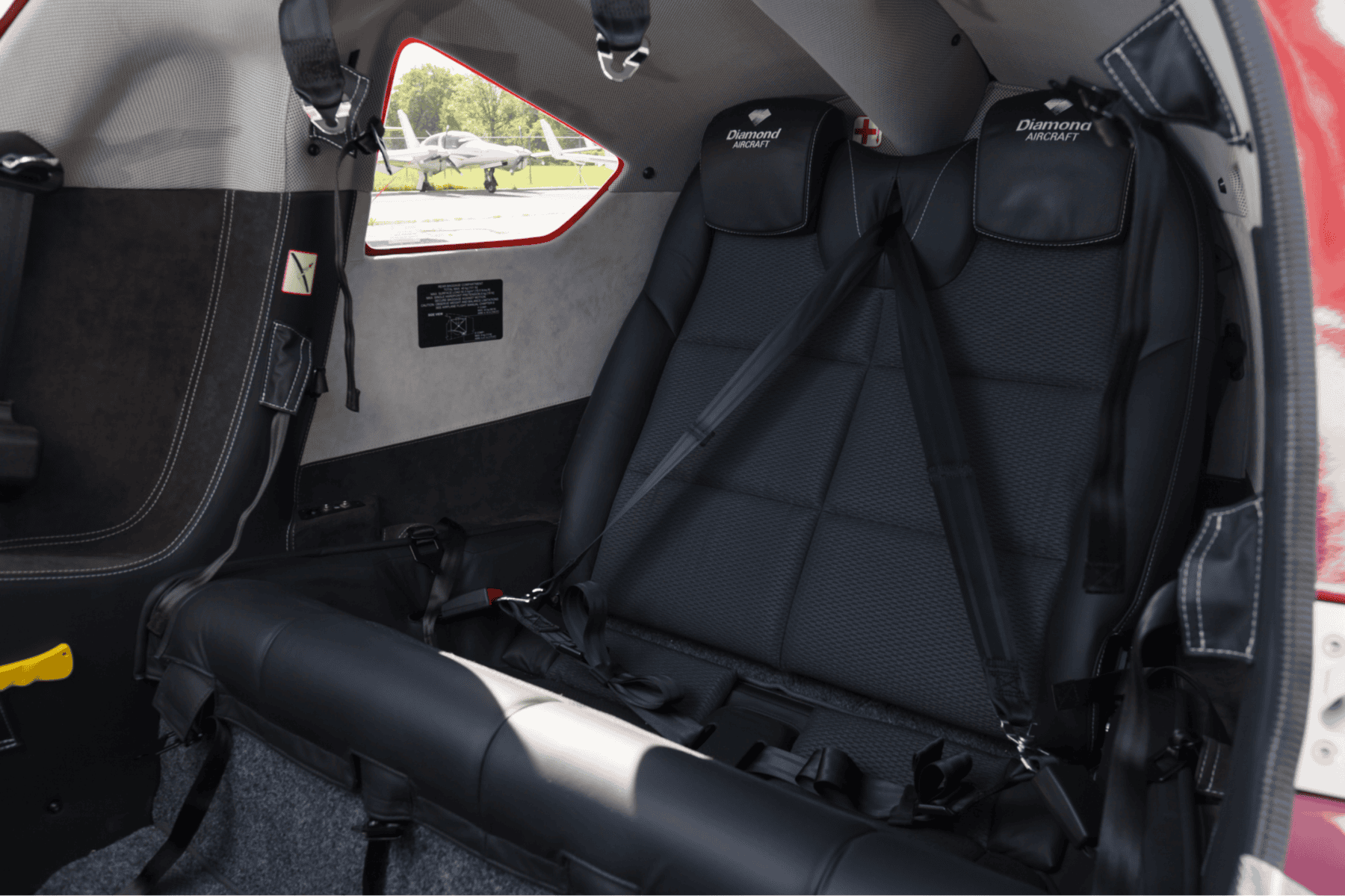 Diamond aircraft cabin interior with seating.