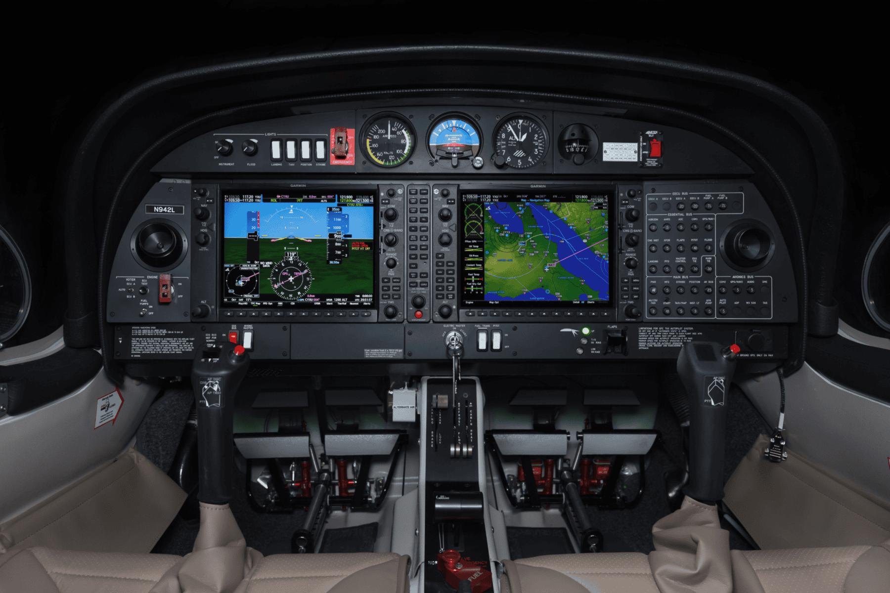 Airplane cockpit with advanced flight instruments and controls.