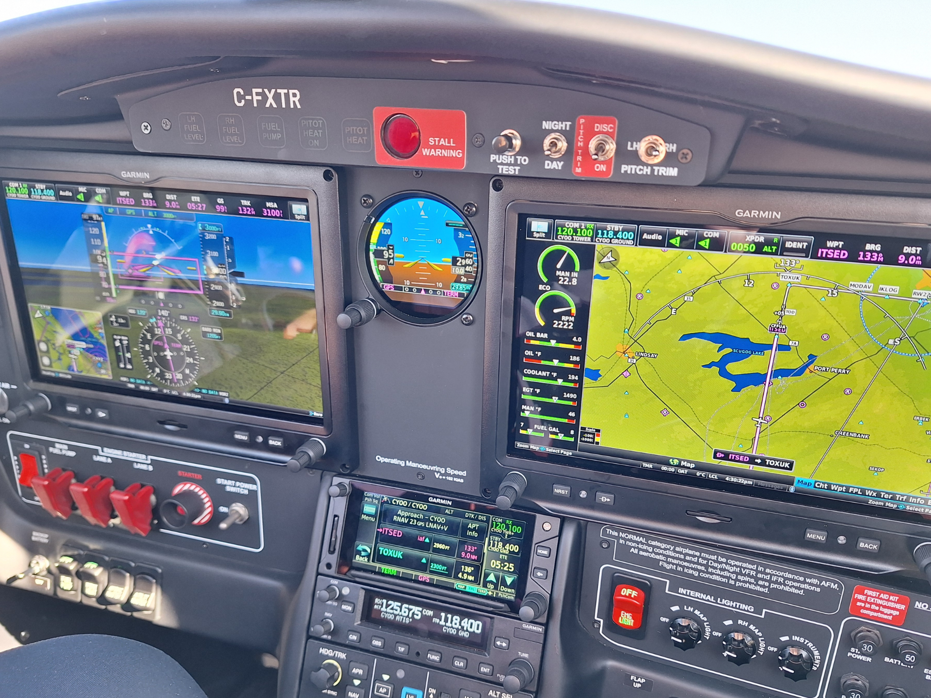 Cockpit panel with multiple aviation displays showing flight instruments and navigation map side by side